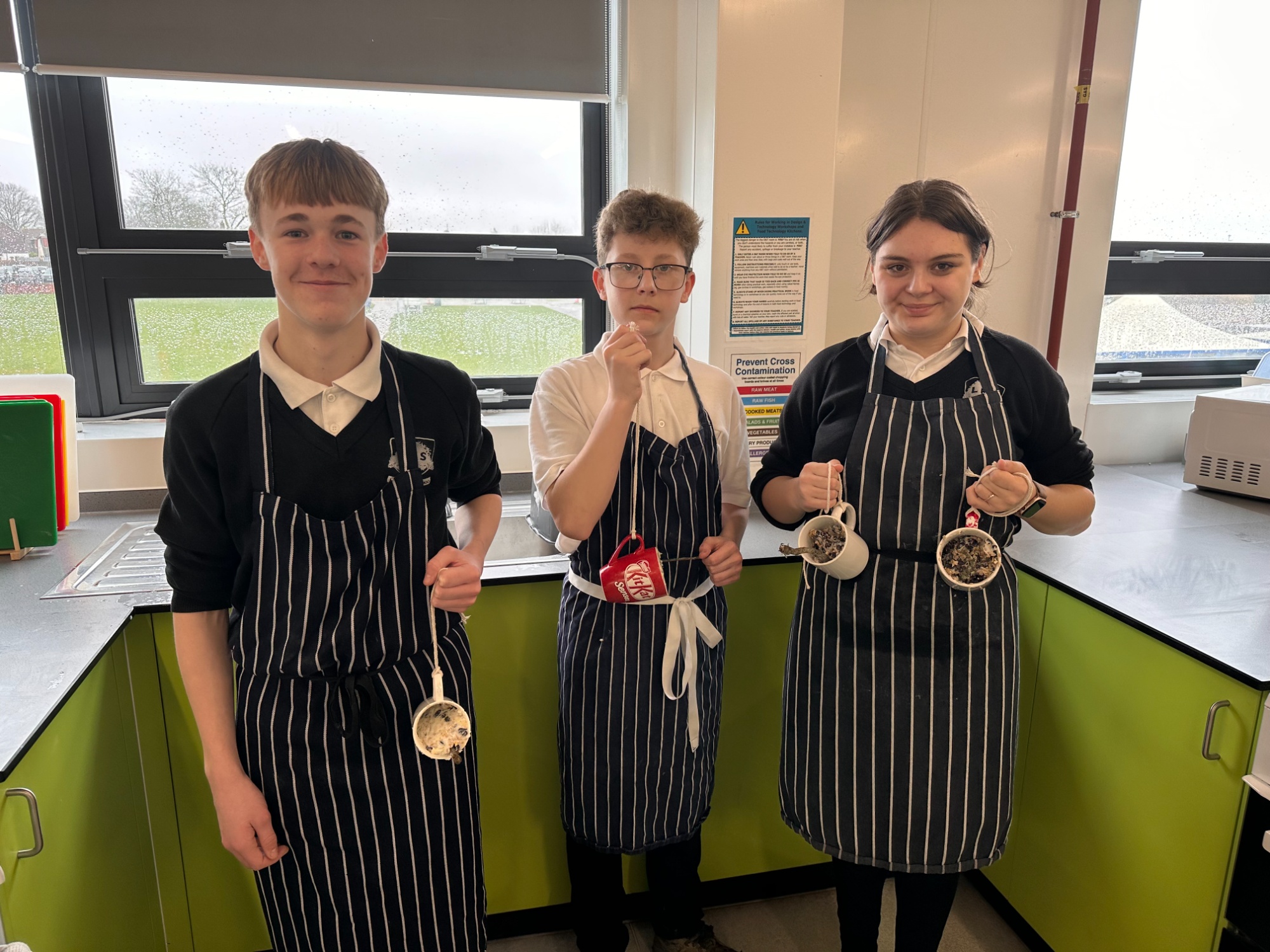 Year 9 Food & Nutrition students with their bird cakes