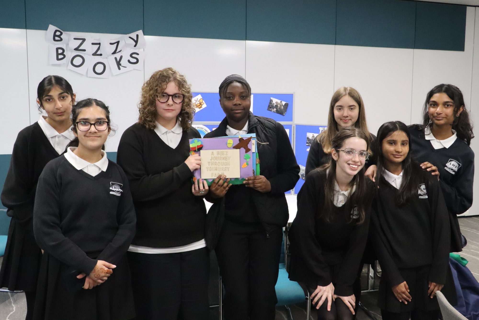 The team with their Bzzzy Book display and prototype