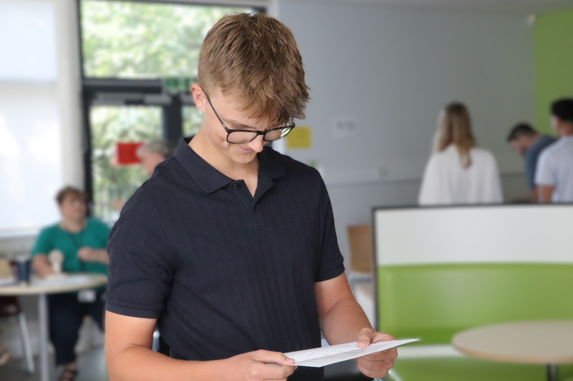 A level Student opens their results
