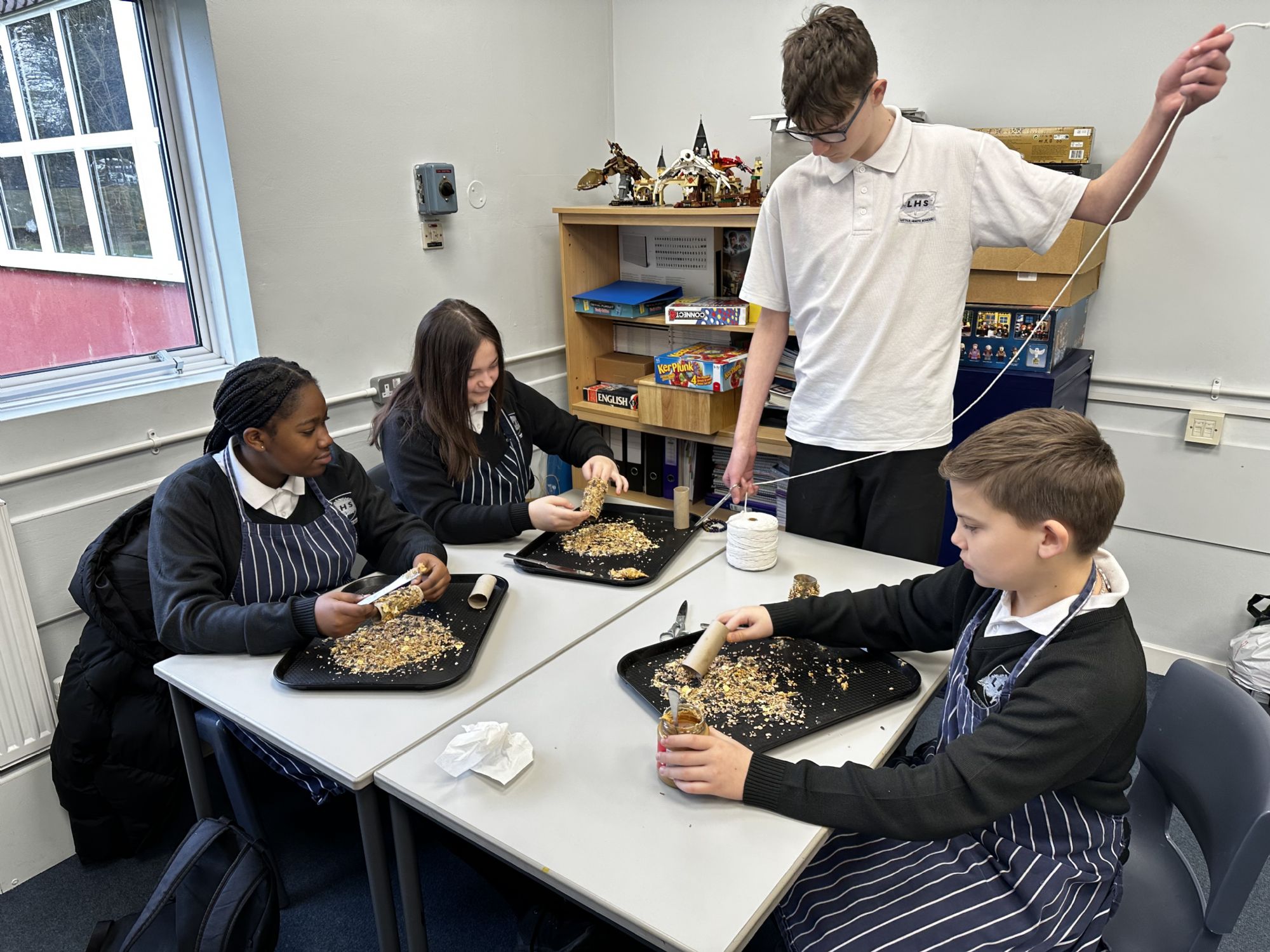 ASDAN group making bird feeders