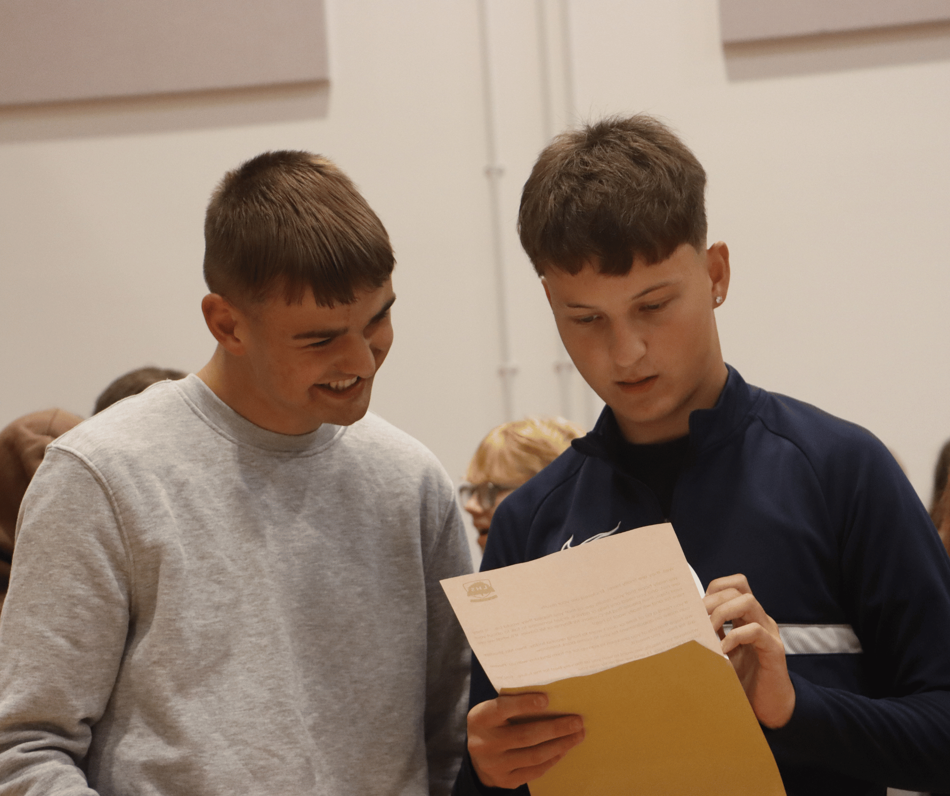 Students looking at their results 