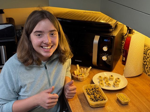Amelia making food for wildlife