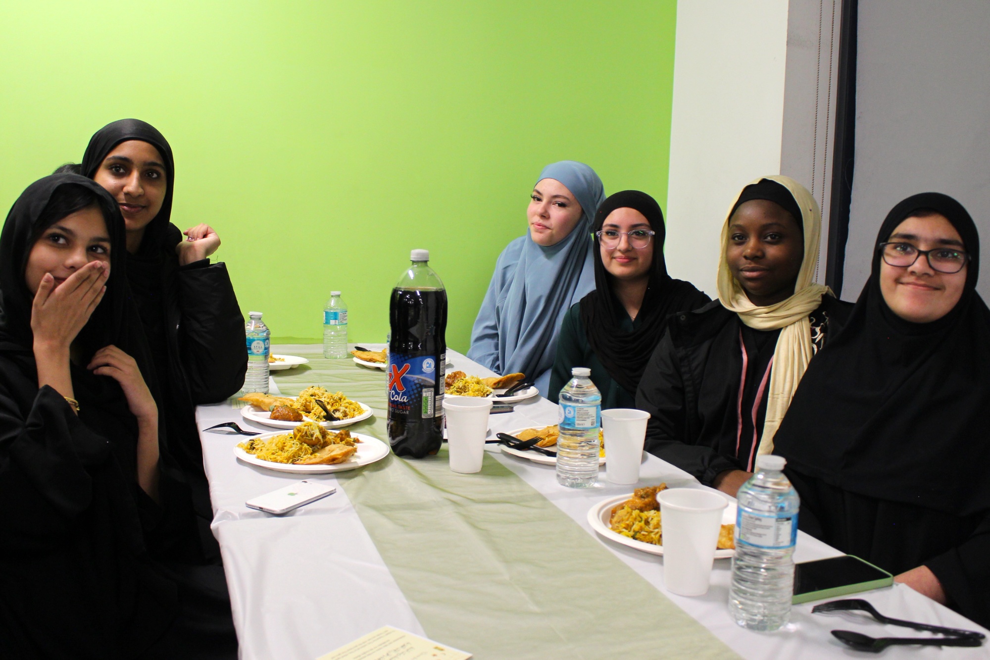 Students enjoy a meal together Students enjoy a meal together